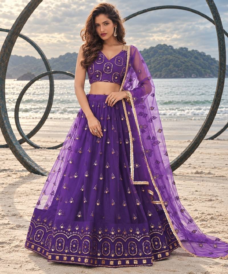PURRPLE NET THREAD WITH ZARI AND SEQUIN WORK FESTIVE LEHENGA CHOLI