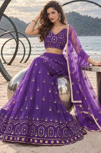 PURRPLE NET THREAD WITH ZARI AND SEQUIN WORK FESTIVE LEHENGA CHOLI