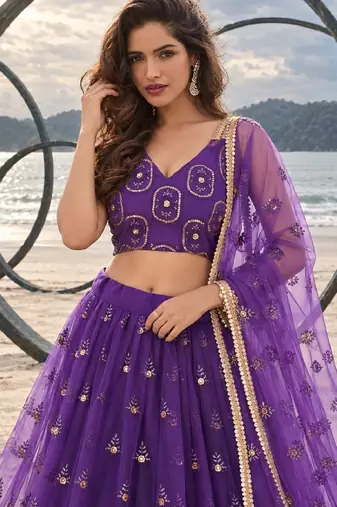 PURRPLE NET THREAD WITH ZARI AND SEQUIN WORK FESTIVE LEHENGA CHOLI