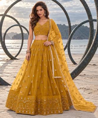 MUSTARD YELLOW NET THREAD WITH ZARI AND SEQUIN WORK FESTIVE LEHENGA CHOLI 1