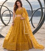 MUSTARD YELLOW NET THREAD WITH ZARI AND SEQUIN WORK FESTIVE LEHENGA CHOLI