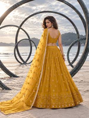 MUSTARD YELLOW NET THREAD WITH ZARI AND SEQUIN WORK FESTIVE LEHENGA CHOLI 2