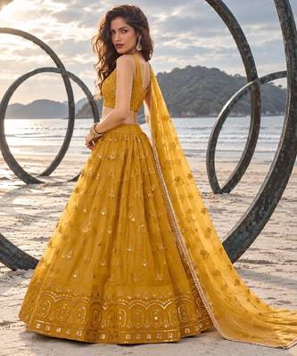 MUSTARD YELLOW NET THREAD WITH ZARI AND SEQUIN WORK FESTIVE LEHENGA CHOLI 3