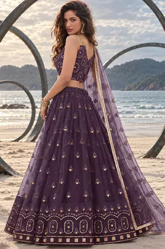 DUSTY WINE NET THREAD WITH ZARI AND SEQUIN WORK FESTIVE LEHENGA CHOLI