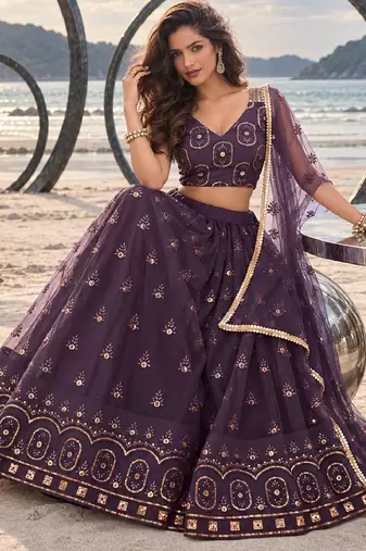 DUSTY WINE NET THREAD WITH ZARI AND SEQUIN WORK FESTIVE LEHENGA CHOLI