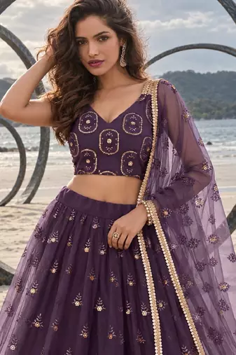 DUSTY WINE NET THREAD WITH ZARI AND SEQUIN WORK FESTIVE LEHENGA CHOLI