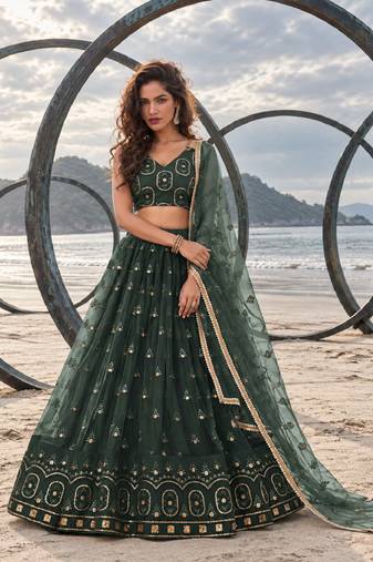 DARK GREEN NET THREAD WITH ZARI AND SEQUIN WORK FESTIVE LEHENGA CHOLI