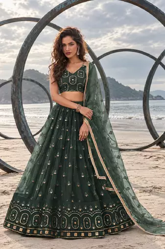 DARK GREEN NET THREAD WITH ZARI AND SEQUIN WORK FESTIVE LEHENGA CHOLI