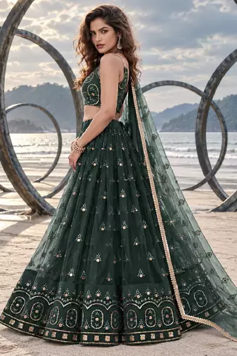 DARK GREEN NET THREAD WITH ZARI AND SEQUIN WORK FESTIVE LEHENGA CHOLI