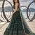 DARK GREEN NET THREAD WITH ZARI AND SEQUIN WORK FESTIVE LEHENGA CHOLI