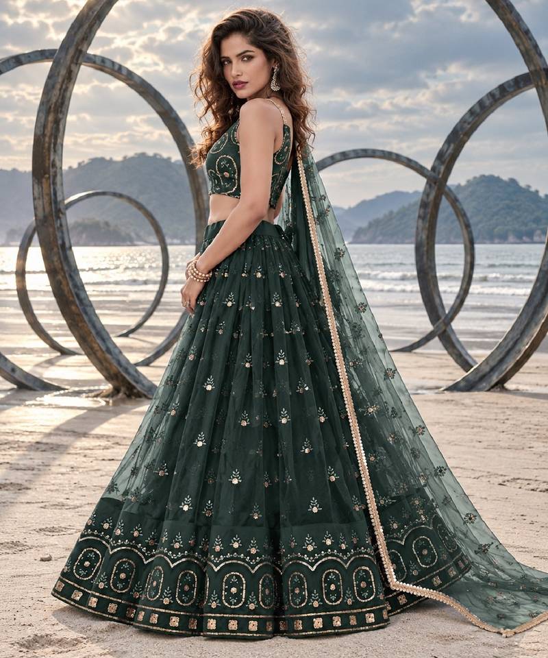 DARK GREEN NET THREAD WITH ZARI AND SEQUIN WORK FESTIVE LEHENGA CHOLI