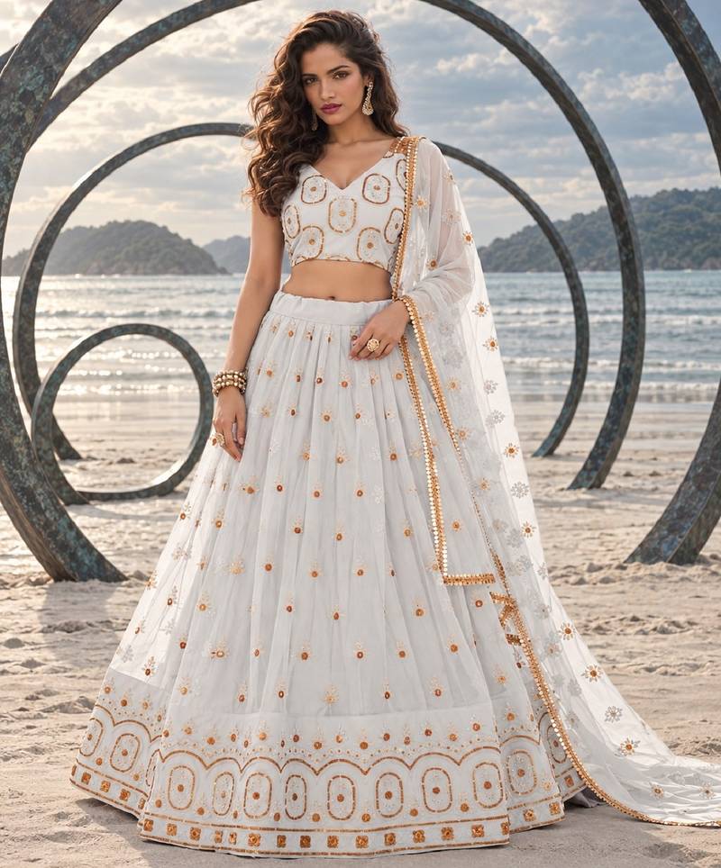 OFF WHITE NET THREAD WITH ZARI AND SEQUIN WORK FESTIVE LEHENGA CHOLI