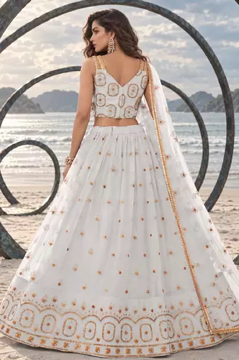 OFF WHITE NET THREAD WITH ZARI AND SEQUIN WORK FESTIVE LEHENGA CHOLI