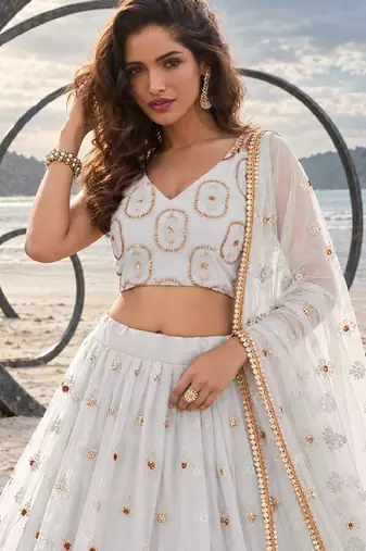 OFF WHITE NET THREAD WITH ZARI AND SEQUIN WORK FESTIVE LEHENGA CHOLI
