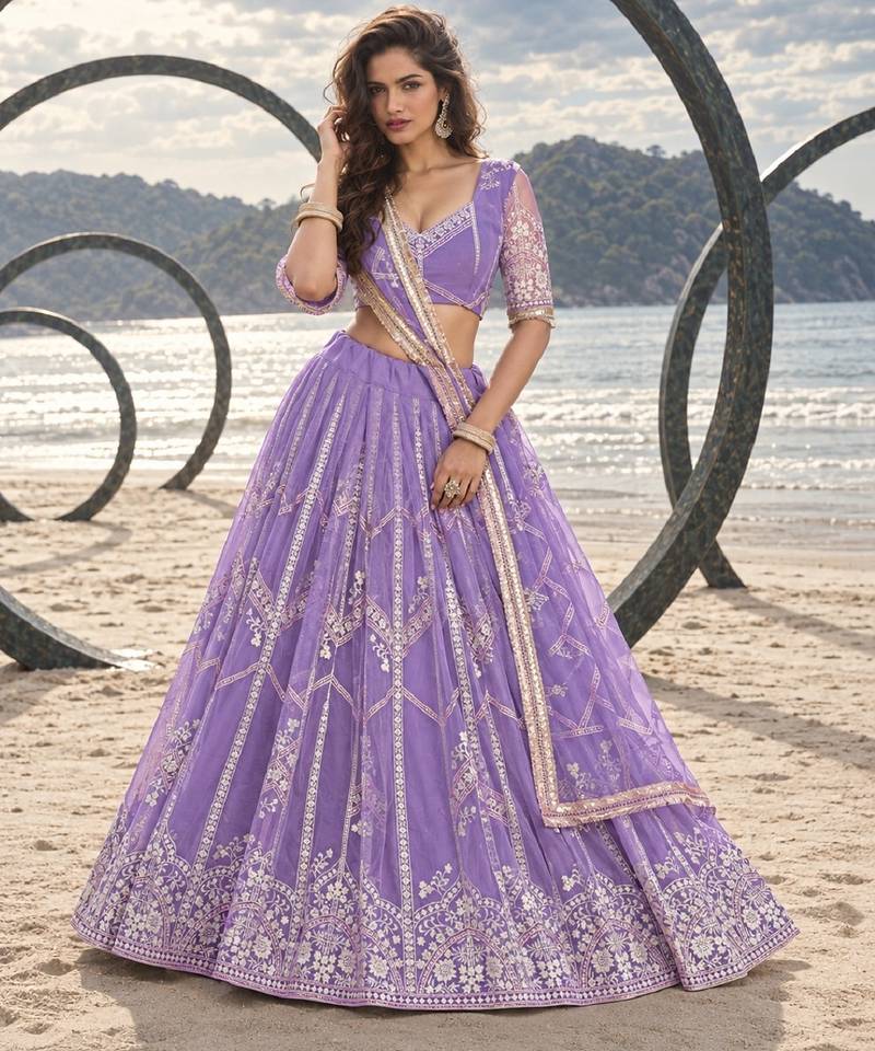 LAVENDER NET THREAD WITH ZARI AND SEQUIN WORK FESTIVE LEHENGA CHOLI