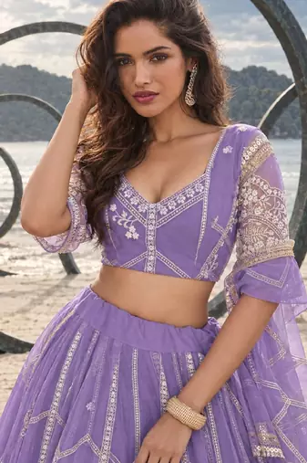 LAVENDER NET THREAD WITH ZARI AND SEQUIN WORK FESTIVE LEHENGA CHOLI
