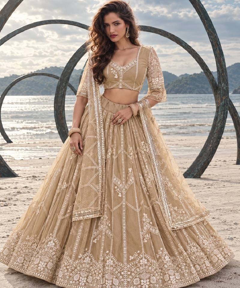 BEIGE NET THREAD WITH ZARI AND SEQUIN WORK FESTIVE LEHENGA CHOLI