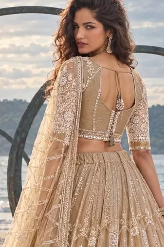 BEIGE NET THREAD WITH ZARI AND SEQUIN WORK FESTIVE LEHENGA CHOLI