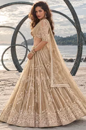 BEIGE NET THREAD WITH ZARI AND SEQUIN WORK FESTIVE LEHENGA CHOLI
