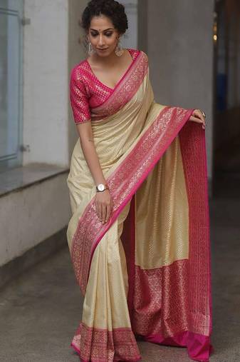 Off white pink silk blend jacuard work festival saree with unstitched blouse piece