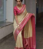 Off white pink silk blend jacuard work festival saree with unstitched blouse piece