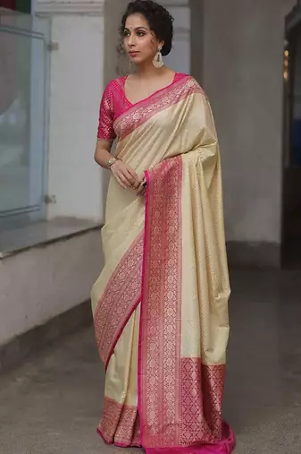 Off white pink silk blend jacuard work festival saree with unstitched blouse piece