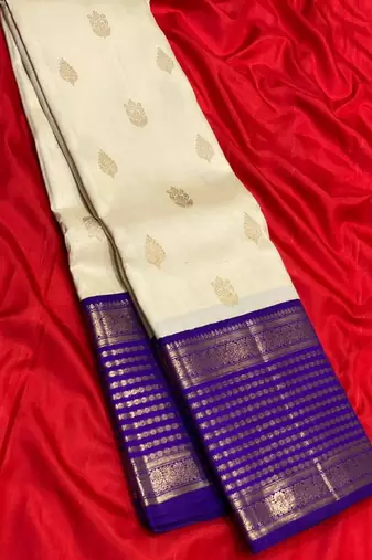 Off white blue silk blend jacuard work festival saree with unstitched blouse piece