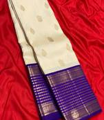 Off white blue silk blend jacuard work festival saree with unstitched blouse piece