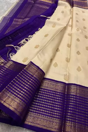 Off white blue silk blend jacuard work festival saree with unstitched blouse piece