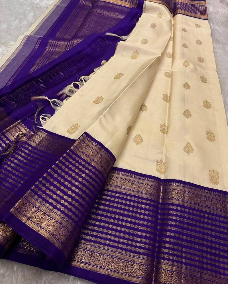Off white blue silk blend jacuard work festival saree with unstitched blouse piece