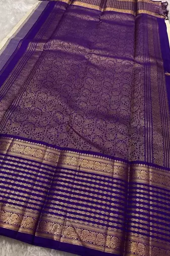 Off white blue silk blend jacuard work festival saree with unstitched blouse piece