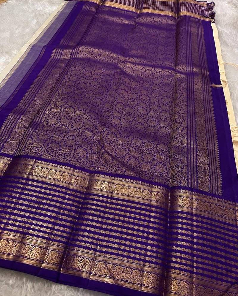 Off white blue silk blend jacuard work festival saree with unstitched blouse piece
