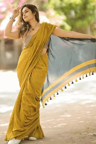 Yellow black linen jacuard work festival saree with unstitched blouse piece