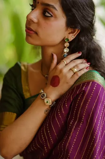Wine green silk blend jacuard work festival saree with unstitched blouse piece