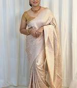 Off white silk blend jacuard work festival saree with unstitched blouse piece
