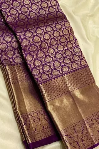 Purple silk blend jacuard work festival saree with unstitched blouse piece