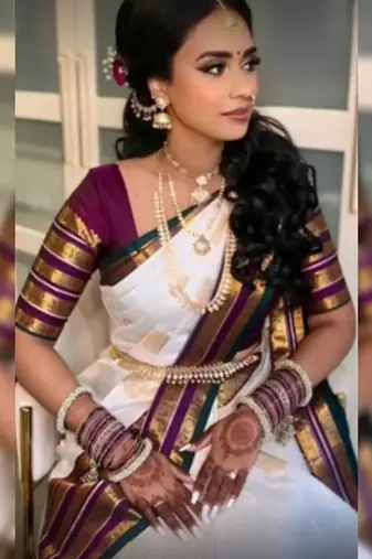 Off white purple silk blend jacuard work festival saree with unstitched blouse piece