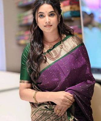 Purple green silk blend jacuard work festival saree with unstitched blouse piece 1