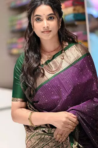Purple green silk blend jacuard work festival saree with unstitched blouse piece