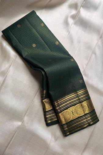 Green silk blend jacuard work festival saree with unstitched blouse piece