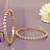 Luminous links solitaire gold plated diamond bangles