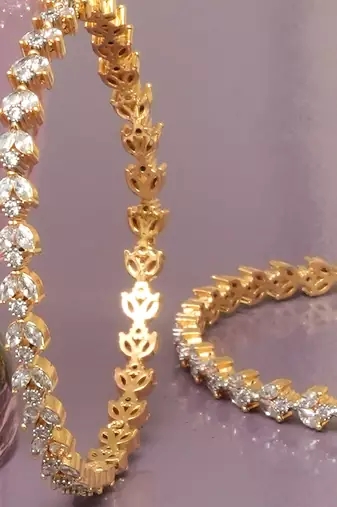 Luminous links solitaire gold plated diamond bangles