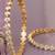 Luminous links solitaire gold plated diamond bangles