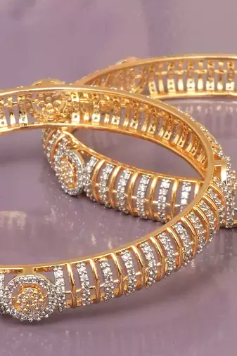 Twining spark gold plated diamond bangles
