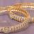 Twining spark gold plated diamond bangles