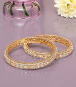 Orbiting leaf gold plated diamond bangles