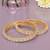 Orbiting leaf gold plated diamond bangles