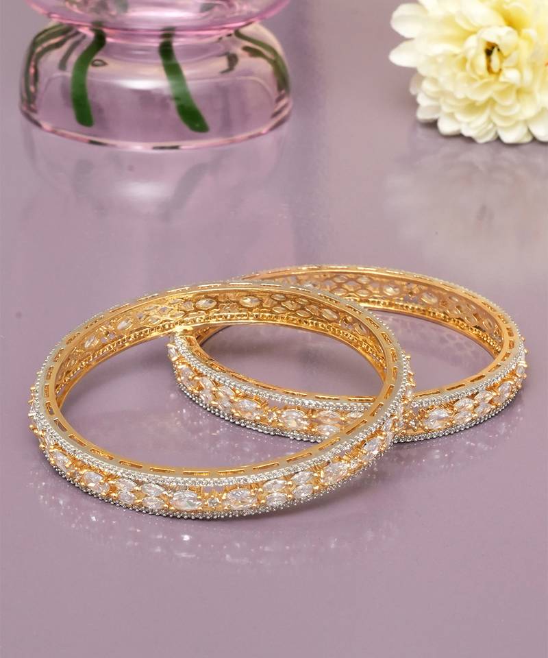 Orbiting leaf gold plated diamond bangles
