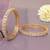 Orbiting leaf gold plated diamond bangles