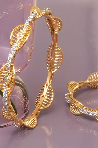 Regal filigree gold plated diamond bangles